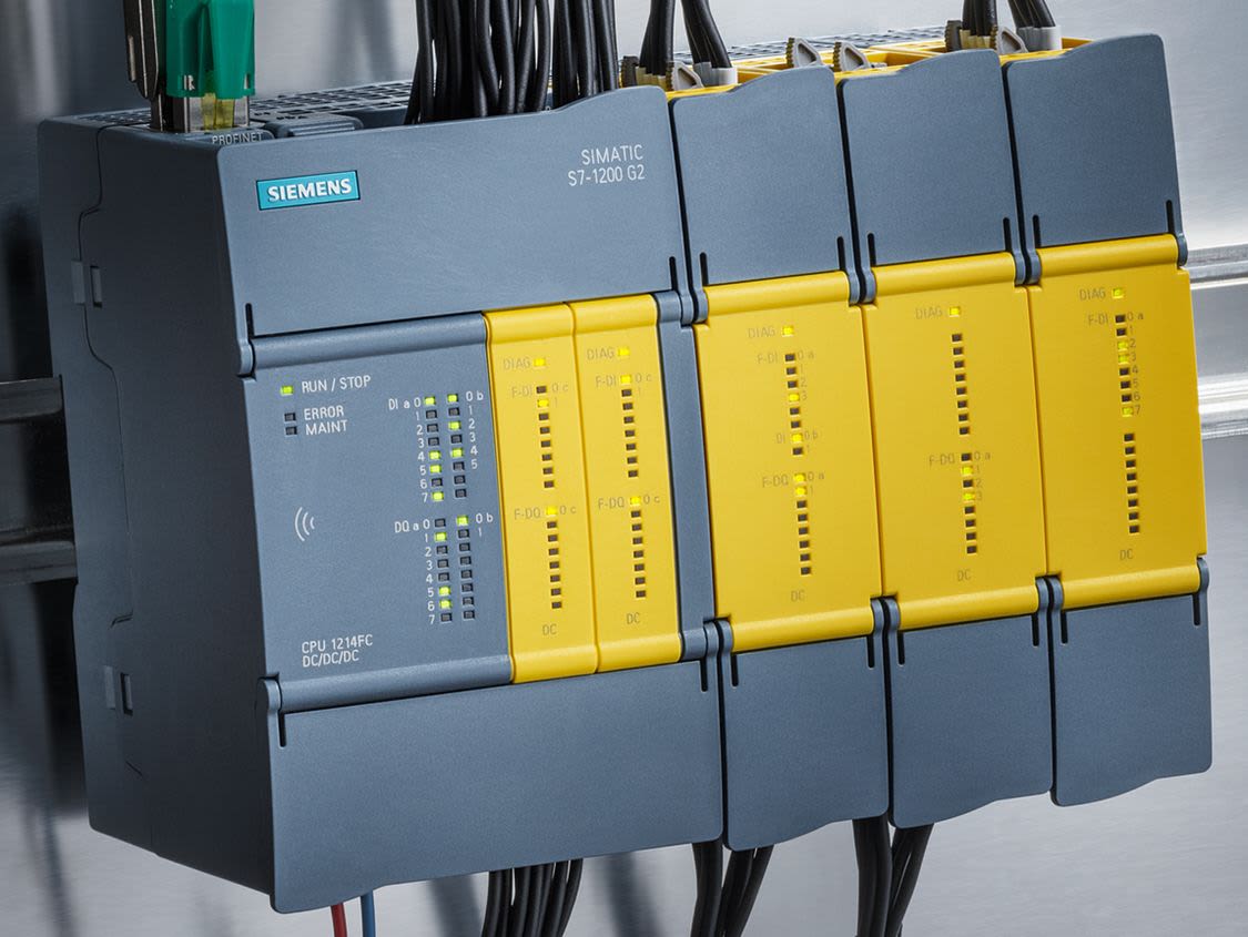 Grey Siemens Simatic cubic programme logic controller with teal siemens logo